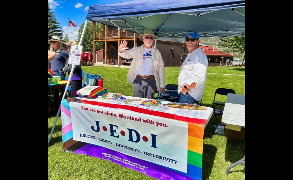 Richard and Kevin in our booth at Ouray County Pride (2023)