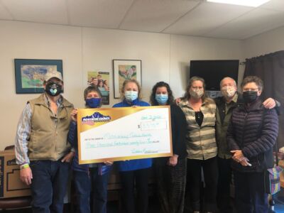 The Montrose County Democratic Party’s Community Outreach Committee presents donations to Northside Health Center Clinical Director Jennifer Suchon. (Courtesy photo/Kevin Kuns)